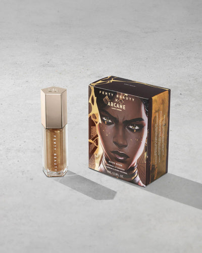 FENTY BEAUTY BY RIHANNA - FENTY BEAUTY X ARCANE GLOSS BOMB UNIVERSAL LIP LUMINIZER  - RISKY RULIN' (MEL) 9ML